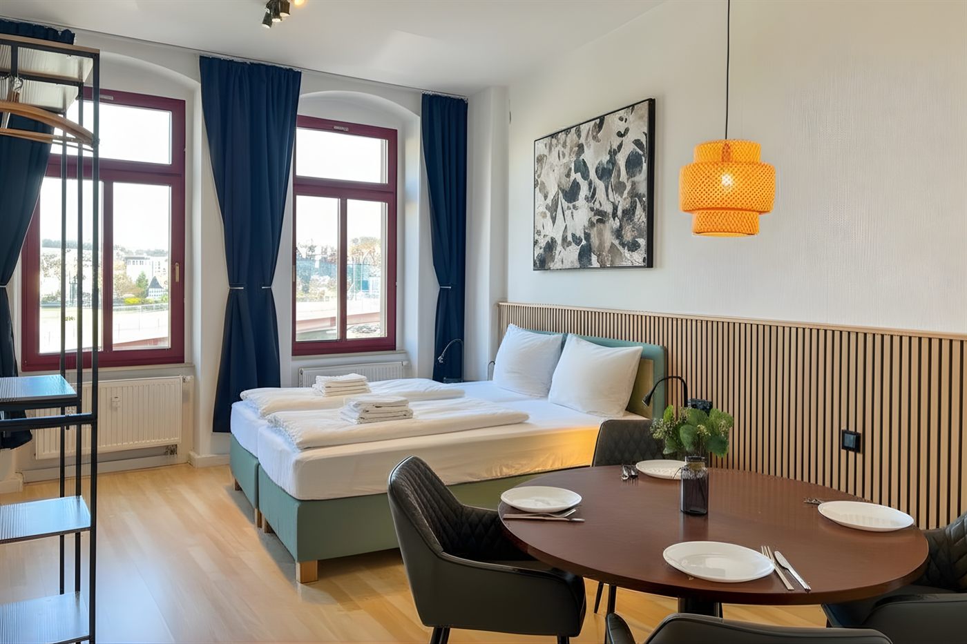 Elbblick Apartment Uferstr. 1 Schlafzimmer mit Essbereich