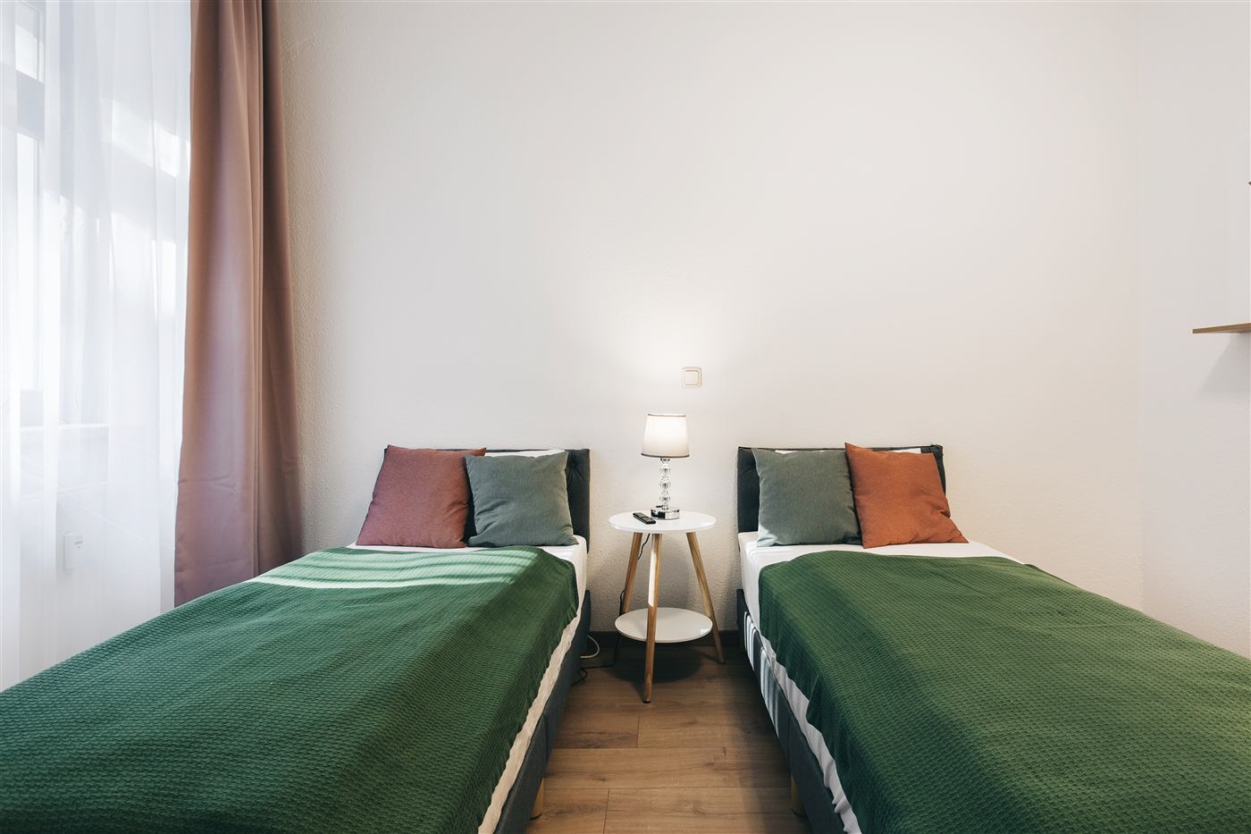 Junior Apartment Meißen Zweibettzimmer mit grünen Decken